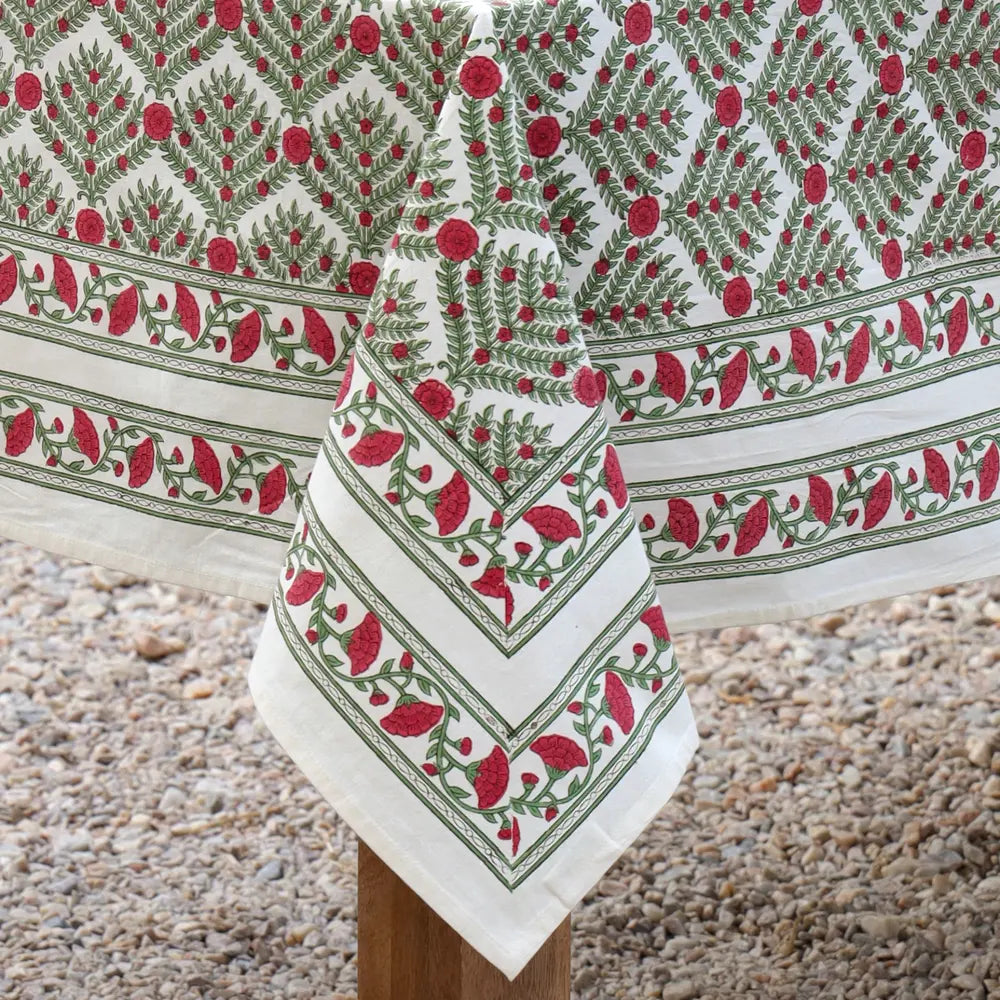 Close-up of Family Tree Cranberry/Green block print tablecloth cotton border