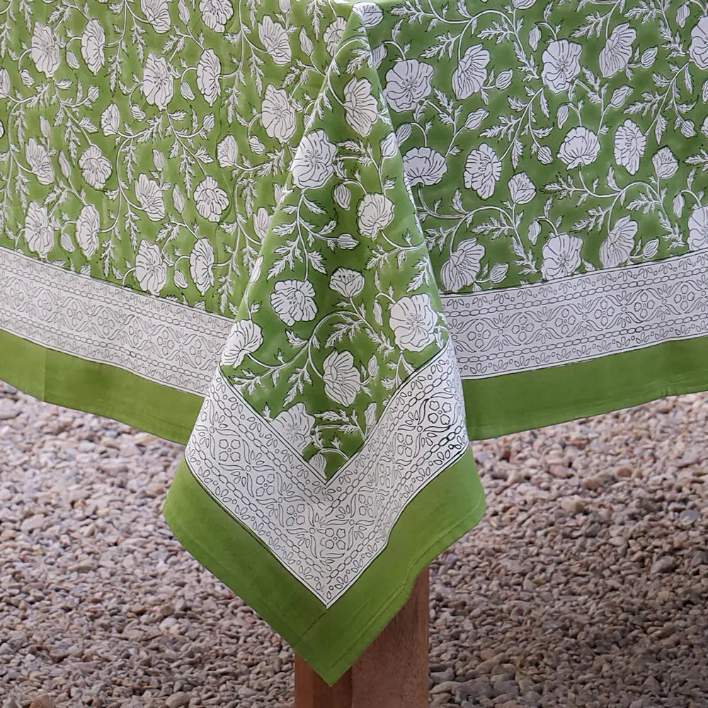 Close-up of Garden Poppy Green block print tablecloth cotton border