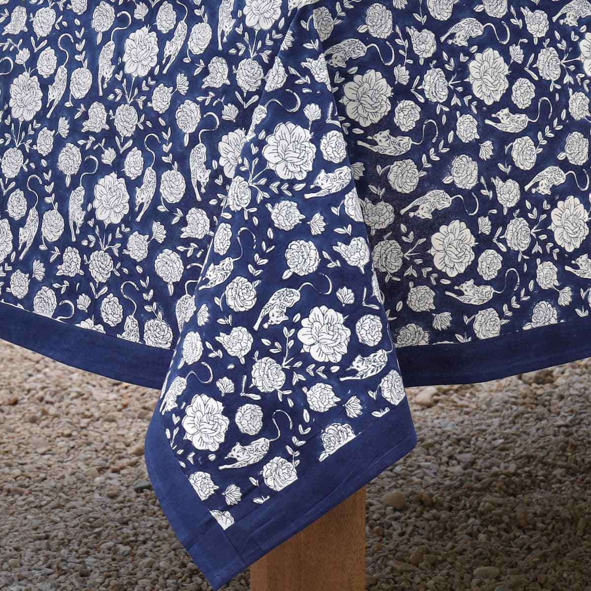 Close-up of Wild Garden Navy block print tablecloth cotton border